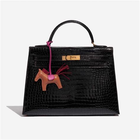 Hermès Rodeo PM Milo Lamb Gold / Rubis / Rose Pourpre